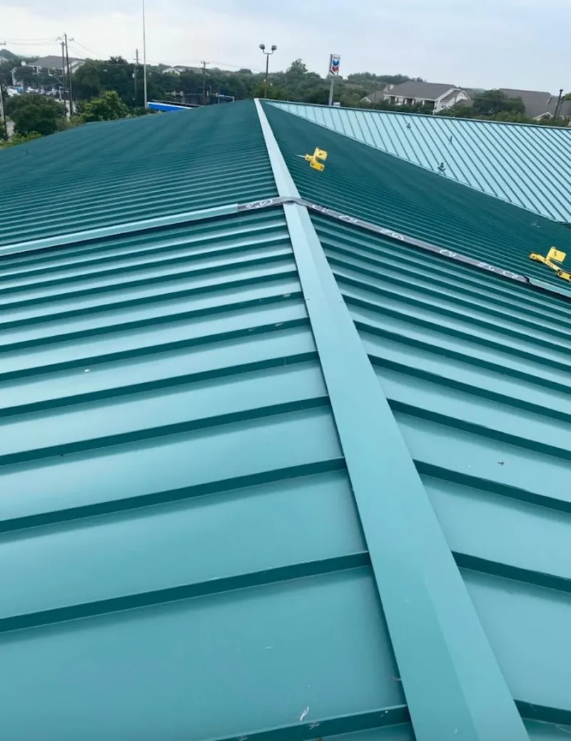 Green commercial metal roof ridge and valley for Metal Roof Repair in Lone Grove